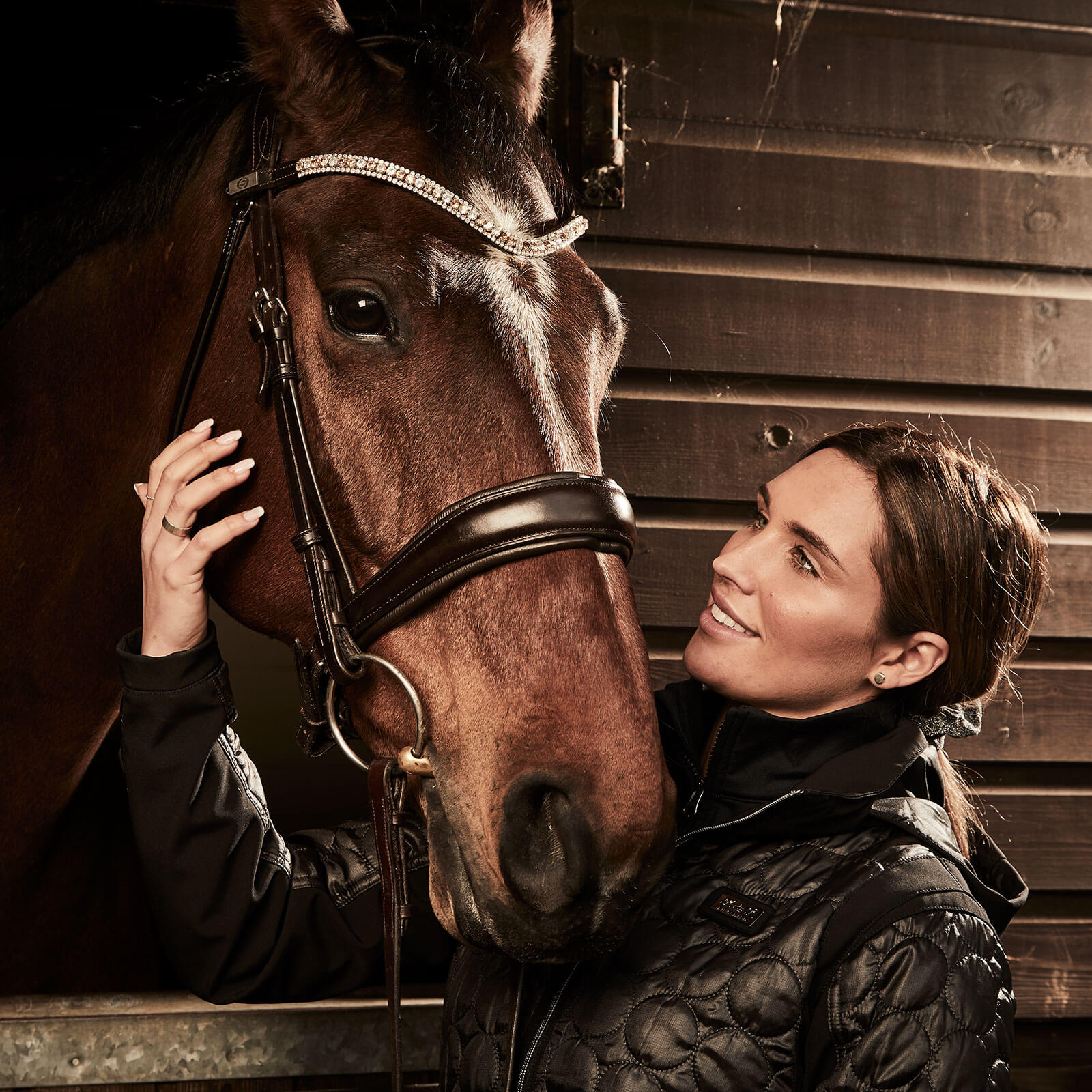 Location photography with horse and horse owner at stables