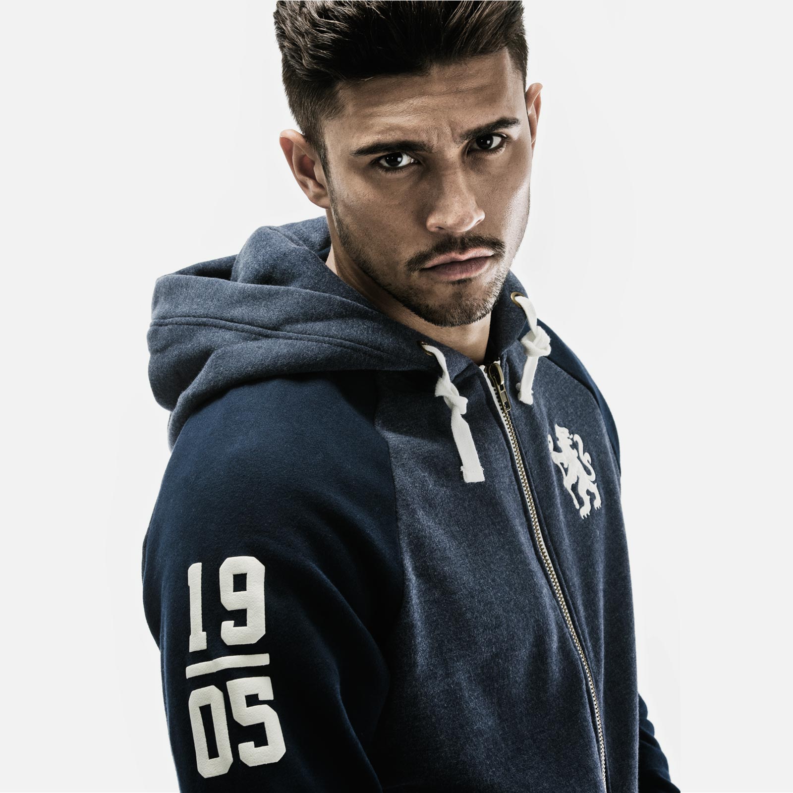 Shot of Nick in Chelsea FC hoodie