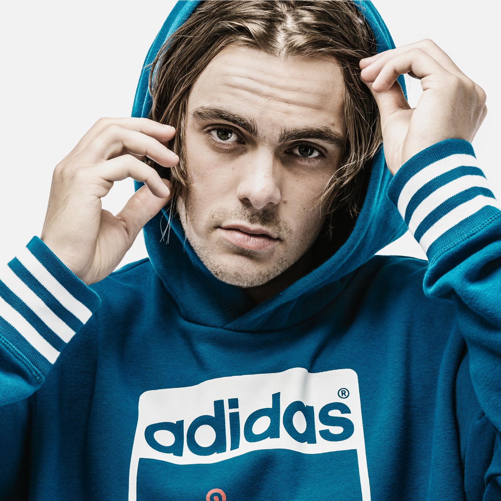 Shot of Lewis in an Adidas hoodie from the Chelsea FC merchandise range