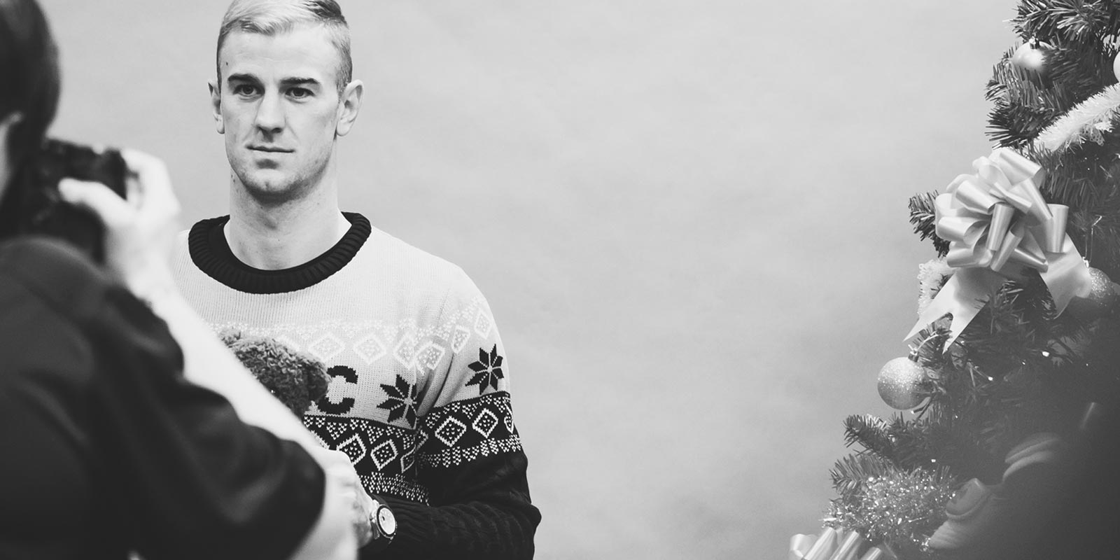 Behind the camera, Joe Hart dons his favourite Christmas jumper