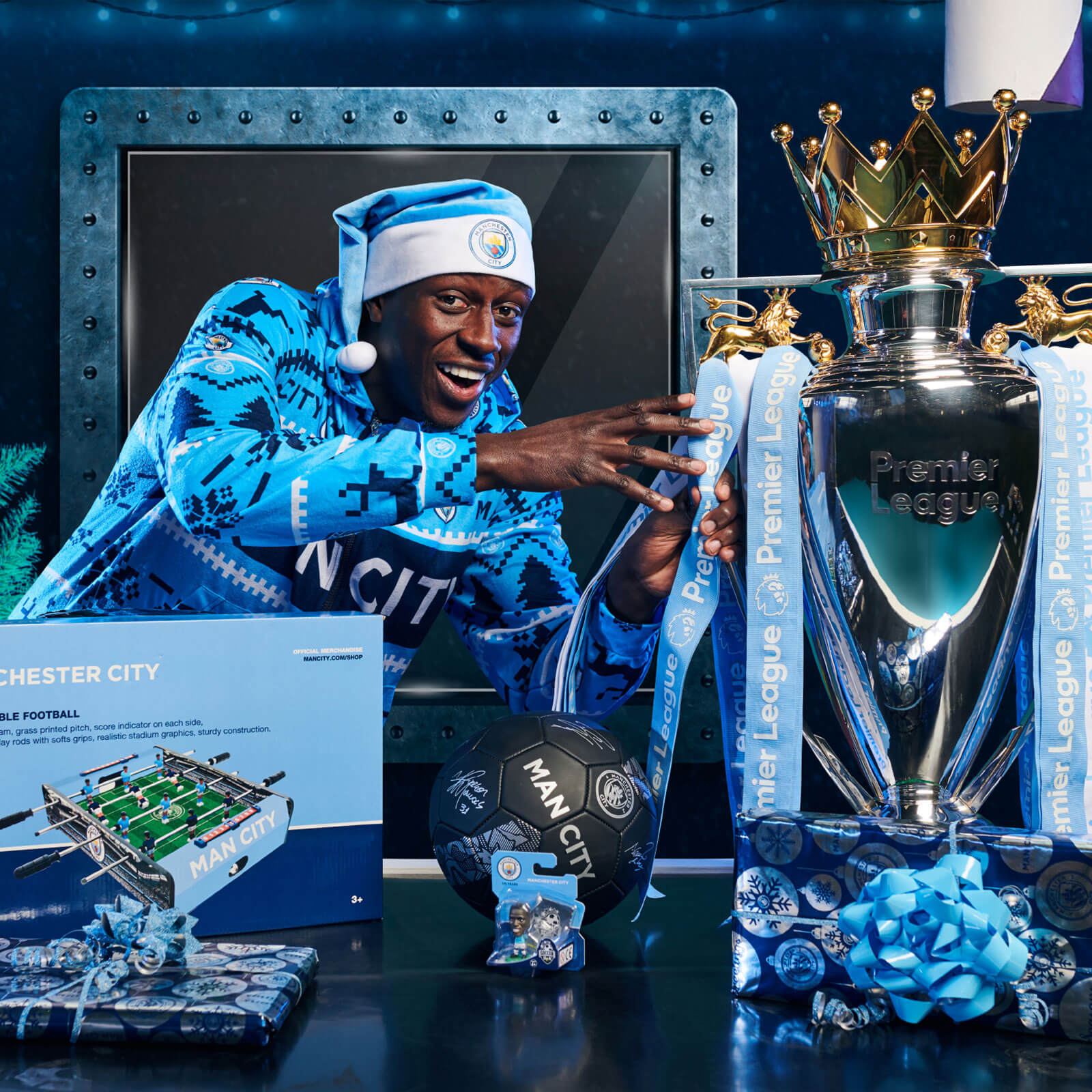 Christmas campaign - Benjamin Mendy on set with Premier League trophy