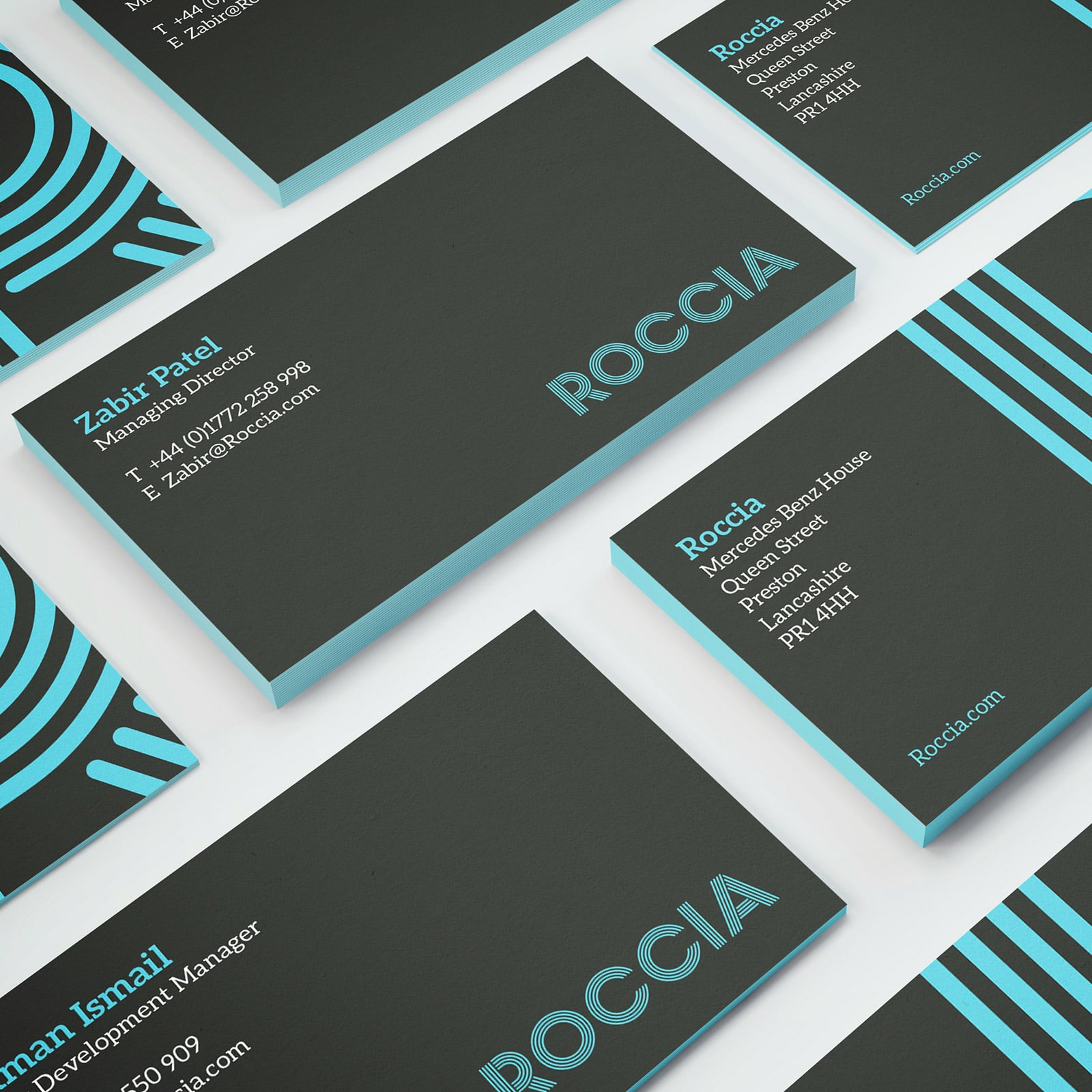 Business cards and other brand collateral were designed in the new brand