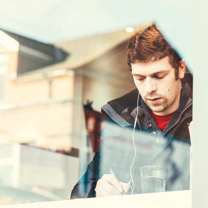 QUB student working in a cafe
