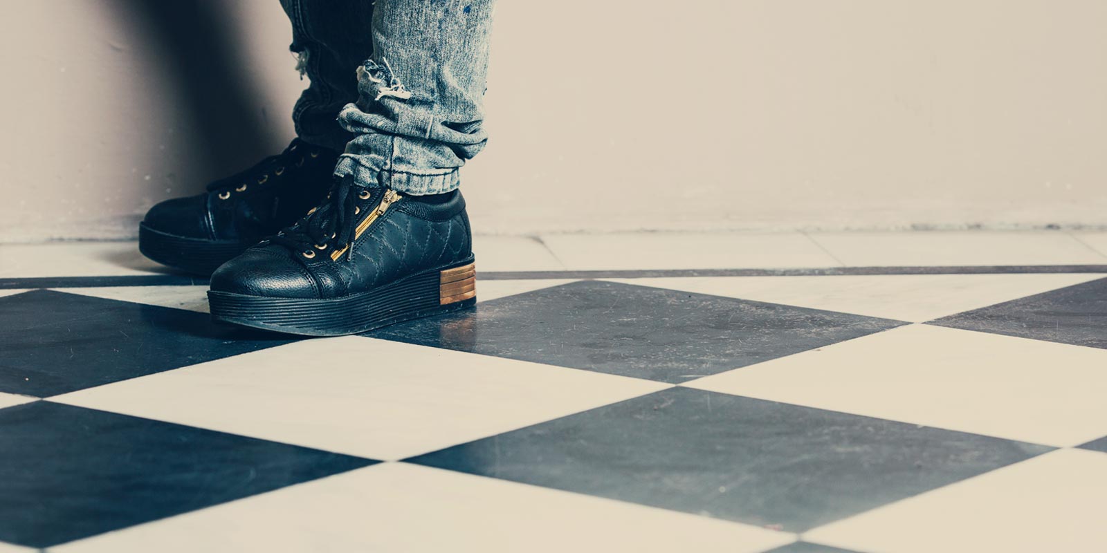 Feet of a young female student wearing Dr Martens