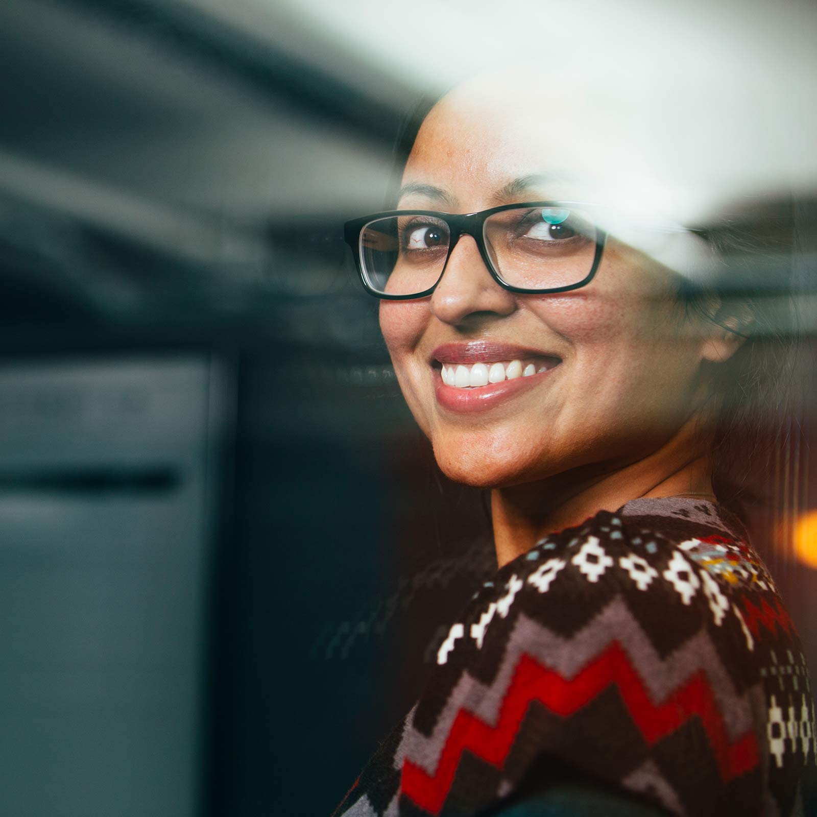 Female shield employee in office