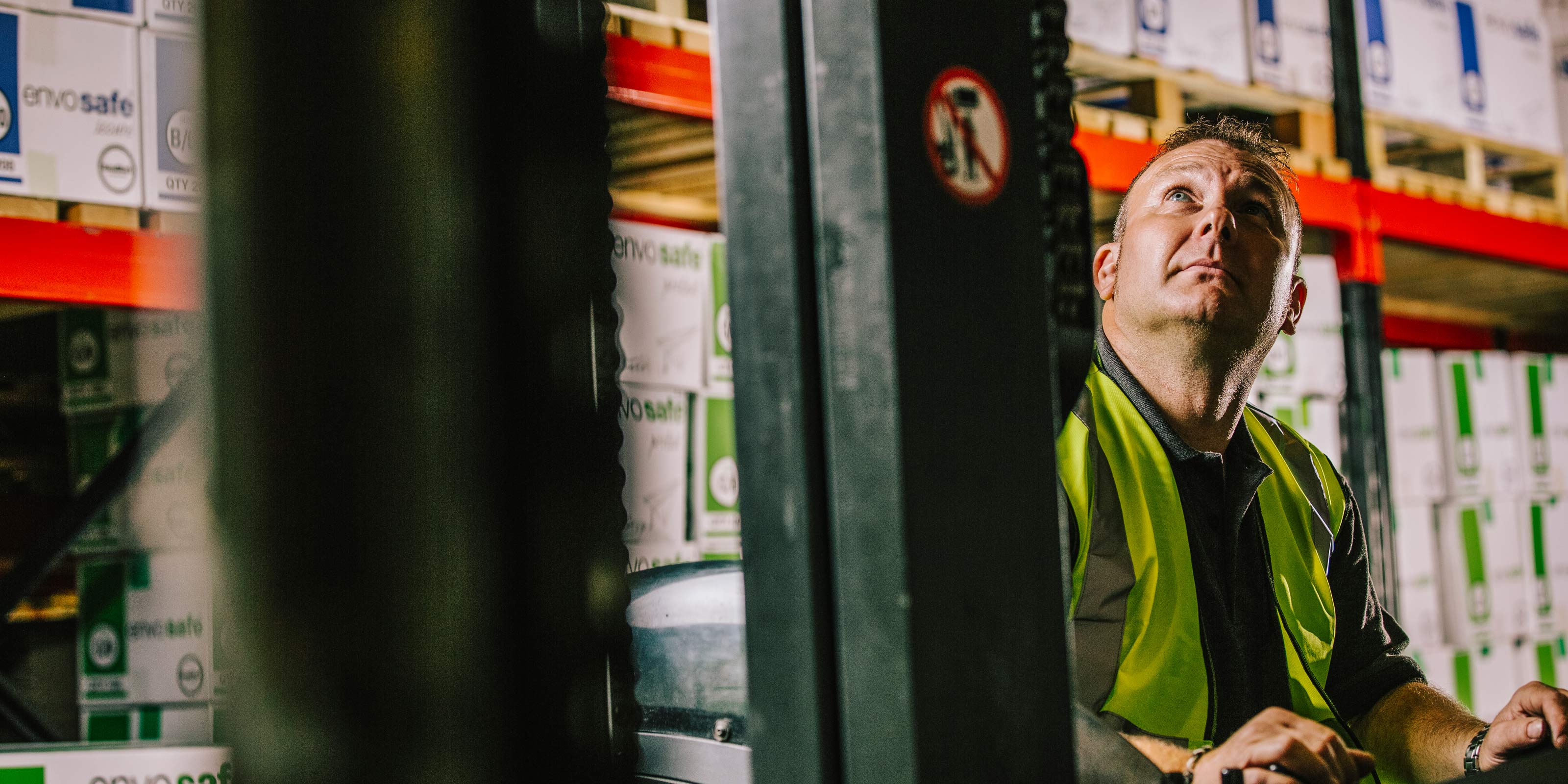 Wessex employee operating a forklift in the warehouse